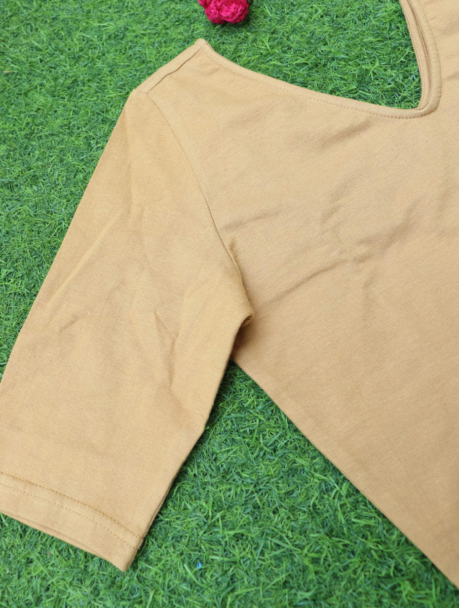 Beige Solid Stretchable Blouse/Crop Top