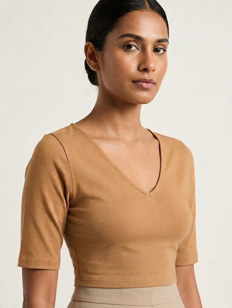 Beige Solid Stretchable Blouse/Crop Top